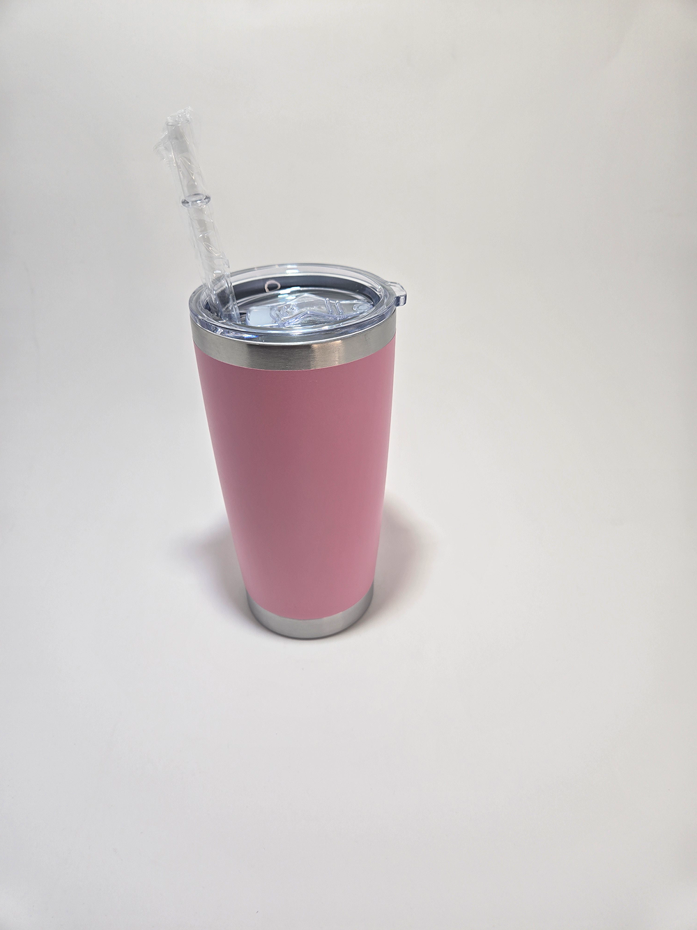 Pink insulated travel tumbler with straw