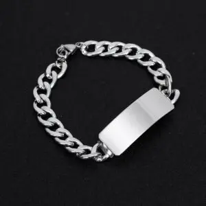 Silver chain bracelet with a blank rectangular plate.