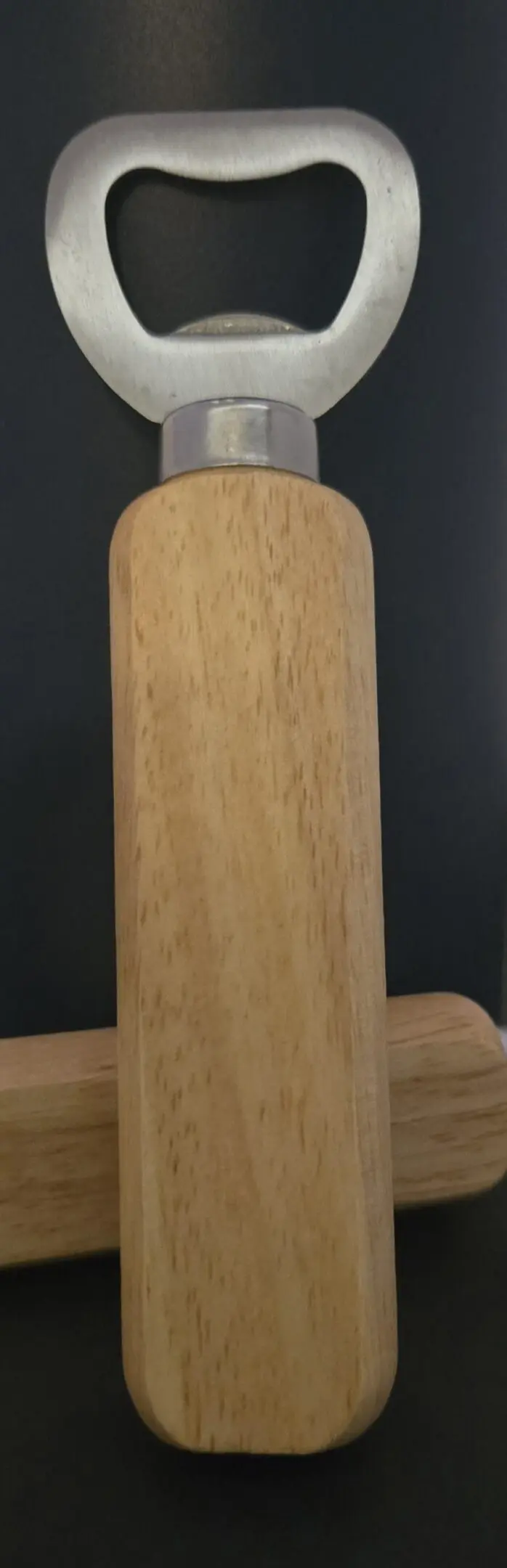 A simple rectangular wooden cutting board with rounded edges.
