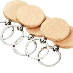 Set of wooden keychains with metal rings in various sizes.