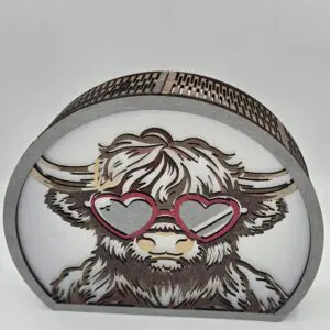 Highland cow with heart-shaped sunglasses