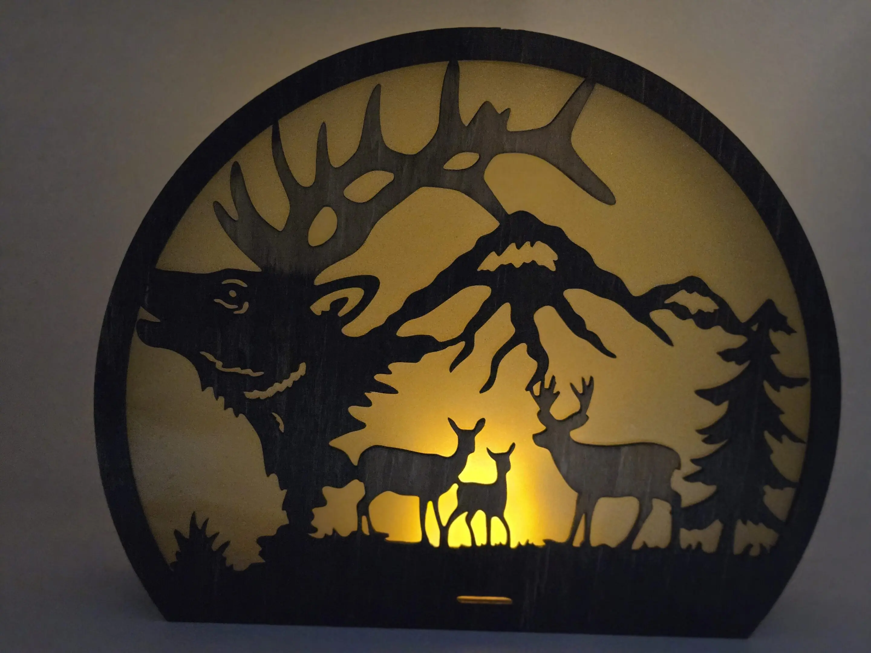 Backlit wooden forest silhouette lamp with deer