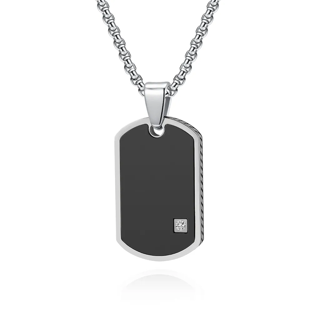 Silver dog tag pendant necklace with black center and small square detail.